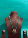 TRENDING LAXMI PENDANT SET WITH CRYSTAL BEADS MALA WITH IMITATION GLASS PEARL FALL