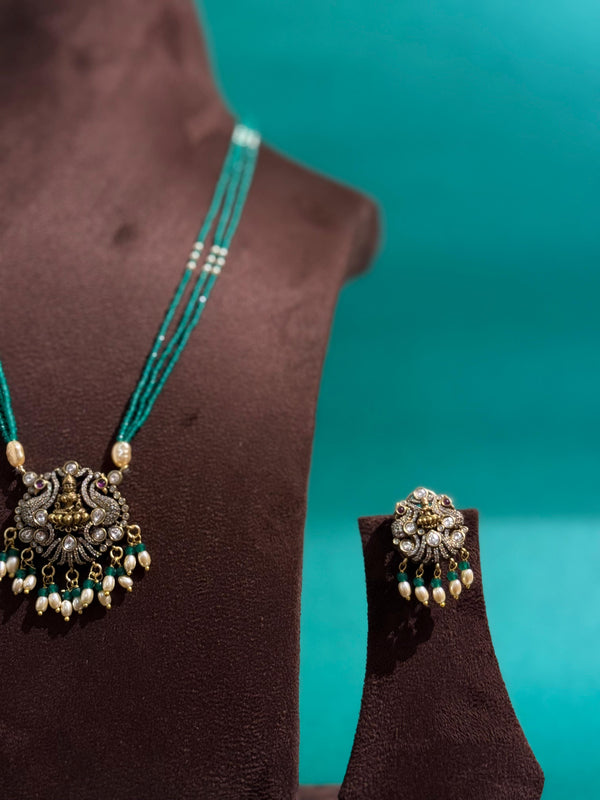 TRENDING LAXMI PENDANT SET WITH CRYSTAL BEADS MALA WITH IMITATION GLASS PEARL FALL