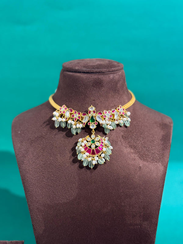 PREMIUM BRASS MATERIAL AND REAL JADAU KUNDAN STONES WITH PEACOCK NECKLACE AND NATURAL STRAWBERRY BEADS