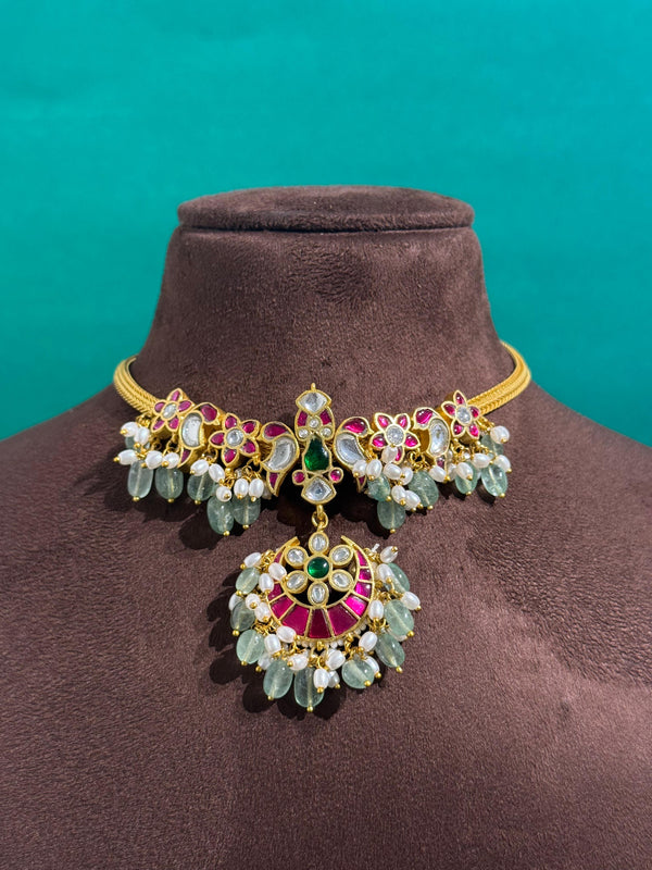 PREMIUM BRASS MATERIAL AND REAL JADAU KUNDAN STONES WITH PEACOCK NECKLACE AND NATURAL STRAWBERRY BEADS