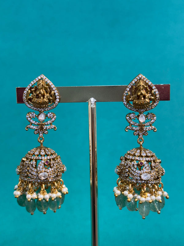 TRENDING JHUMKA'S IN PREMIUM BRASS MATERIAL WITH CUBIC ZIRCONIA STONES,VICTORIAN POLISH AND NATURAL STRAWBERRY BEADS