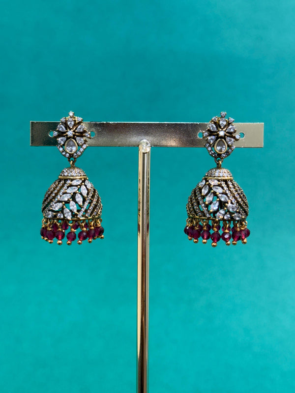 TRENDING JHUMKA'S IN PREMIUM BRASS MATERIAL WITH CUBIC ZIRCONIA STONES AND VICTORIAN POLISH