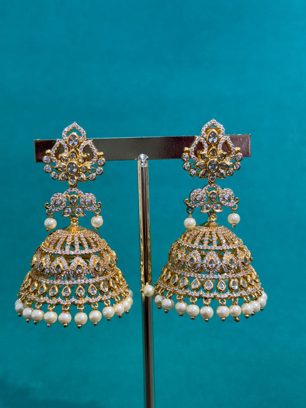 TRENDING JHUMKA'S IN PREMIUM BRASS MATERIAL WITH CUBIC ZIRCONIA STONES AND SWARVOSKI BEADS FALL