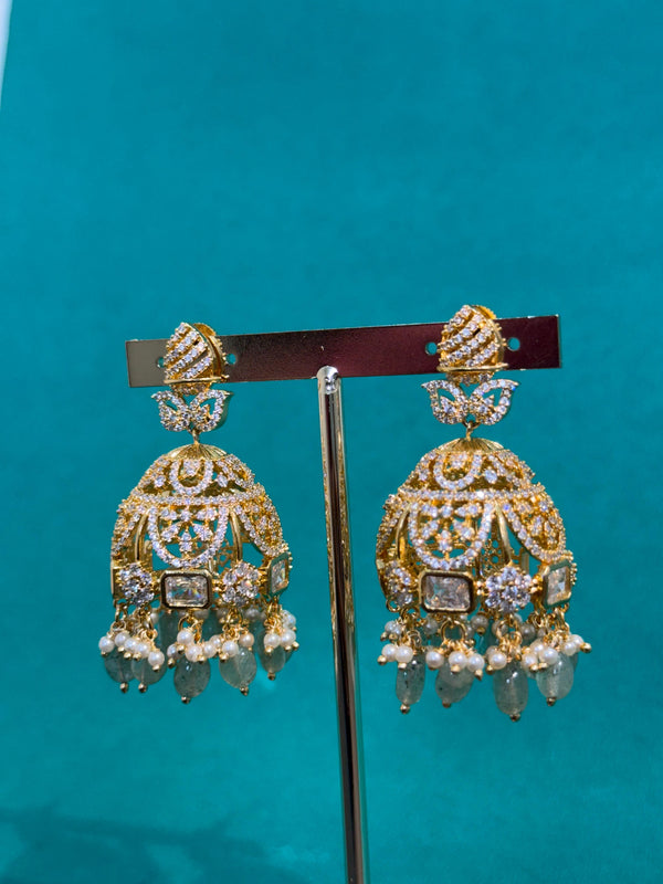 TRENDING JHUMKA'S IN PREMIUM BRASS MATERIAL WITH CUBIC ZIRCONIA STONES AND NATURAL STRAWBERRY BEADS