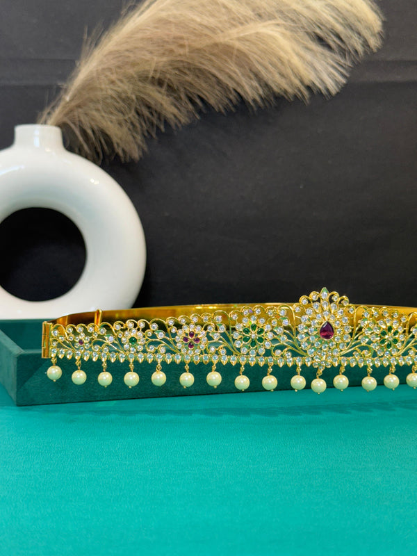 TRENDING VADDANAM WITH GOLD POLISH AND IMITATION GLASS PALACE FALL