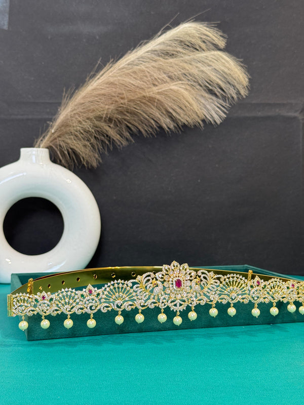 TRENDING PEACOCK VADDANAM WITH GANGA JAMUNA POLISH AND CUBIC ZIRCONIA STONES AND IMITATION GLASS PALACE FALL