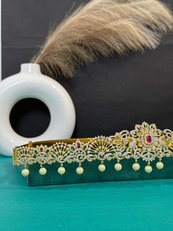 TRENDING PEACOCK VADDANAM WITH GANGA JAMUNA POLISH AND CUBIC ZIRCONIA STONES AND IMITATION GLASS PALACE FALL