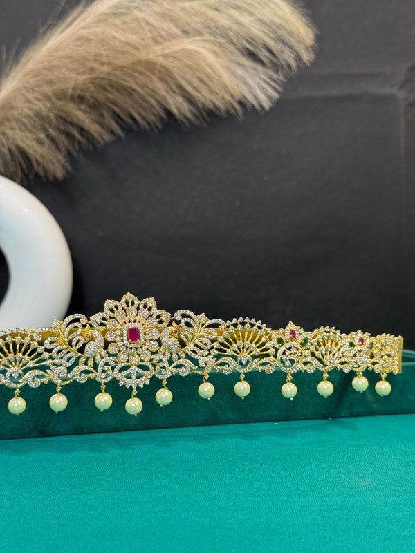 TRENDING PEACOCK VADDANAM WITH GANGA JAMUNA POLISH AND CUBIC ZIRCONIA STONES AND IMITATION GLASS PALACE FALL