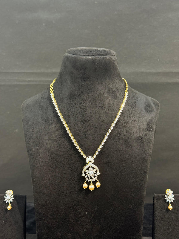 TRENDING NECKLACE SET IN GANGA JAMUNA POLISH WITH CUBIC ZIRCONIA STONES