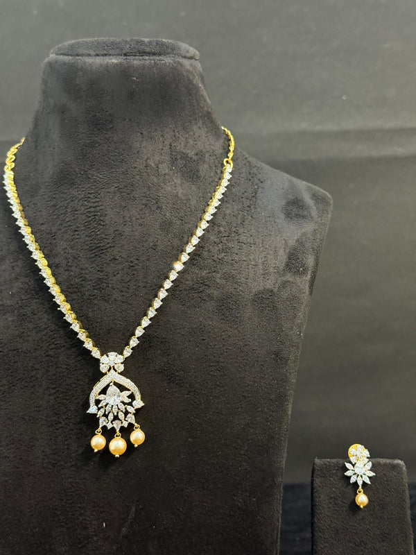 TRENDING NECKLACE SET IN GANGA JAMUNA POLISH WITH CUBIC ZIRCONIA STONES