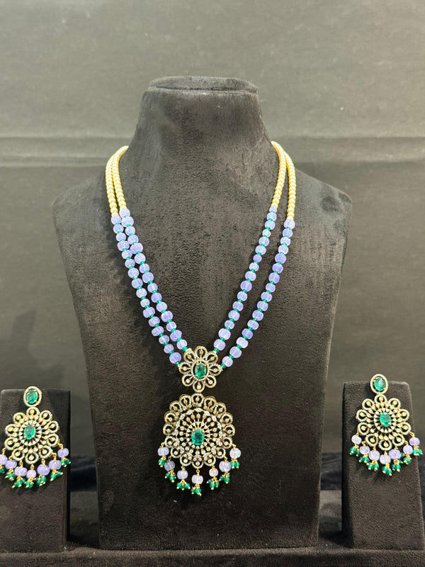 TRENDING PENDANT SET IN VICTORIAN POLISH WITH SWAROVSKI PEARL AND PUMPKIN BEADS